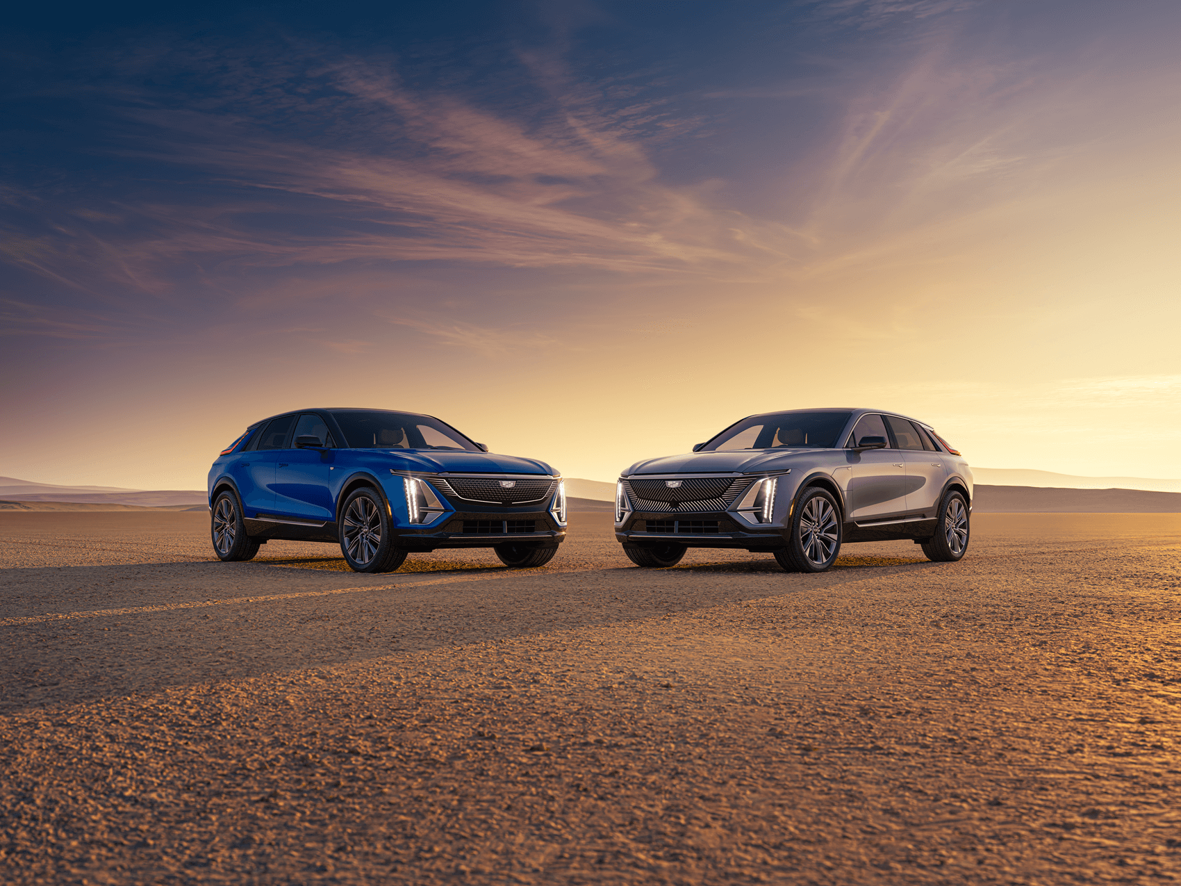 Cadillac LYRIQ parked off-road with a sunset backdrop